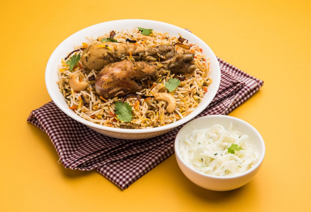 Aromatic biryani rice dish served with spices, featured in a blog about the best biryani in Los Angeles.