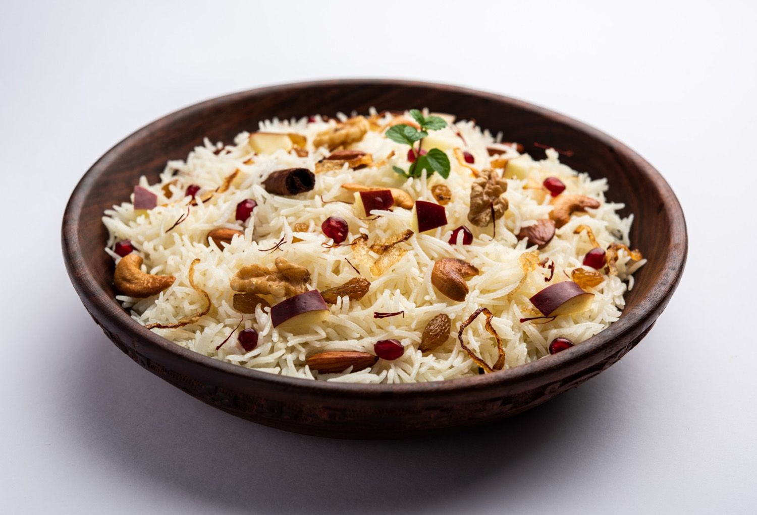 Fragrant Indian rice dishes like jeera rice and pulao, featured as perfect side dishes.