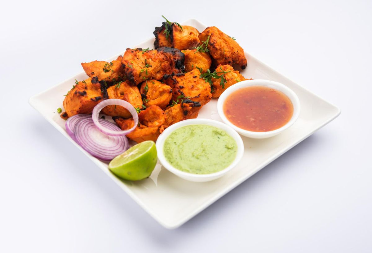 Delicious Indian dishes served together, representing authentic halal dining experience.