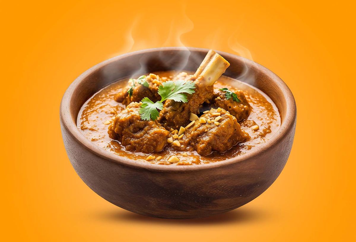 Traditional Rogan Josh lamb curry served with rich spices and gravy.
