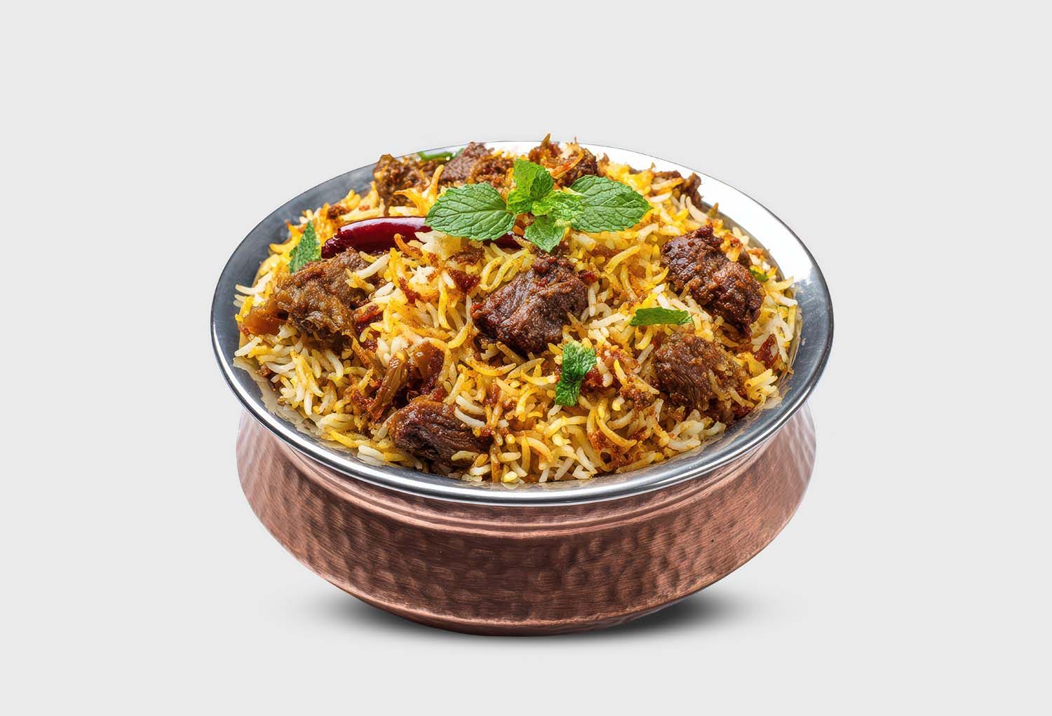 Biryani rice and curry dishes paired together, highlighting perfect Indian meal combinations.